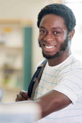 student smiling at the camera